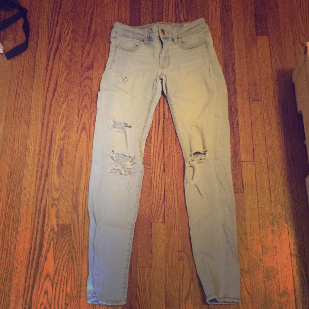 Distressed American eagle blue skinny jeans